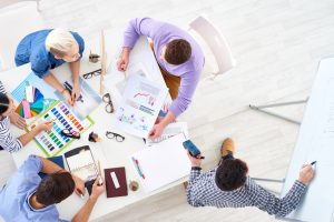 Design team and design manager having a meeting